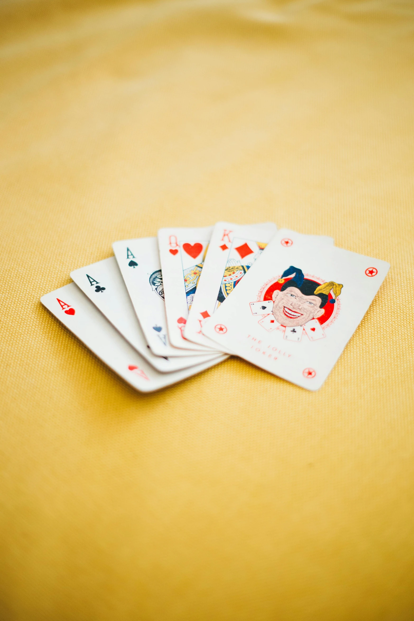 a pile of playing cards sitting on top of a table, thumbnail, -4