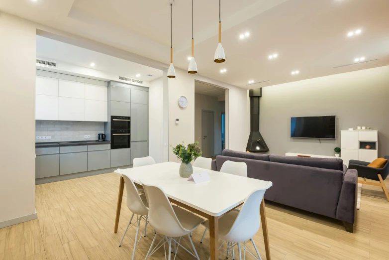 a living room filled with furniture and a flat screen tv, a picture, by Adam Marczyński, pexels contest winner, light and space, white kitchen table, 9 9 designs, suspended ceiling, interior! design