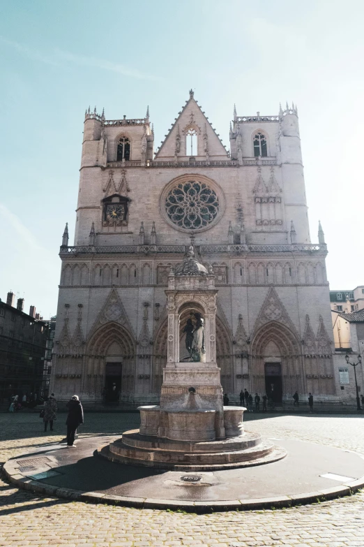 a large building with a fountain in front of it, a statue, inspired by Master of Saint Giles, alabaster gothic cathedral, cam de leon, pink marble building, buttresses