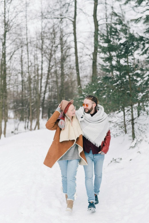 a man and a woman walking in the snow, pexels contest winner, wearing a scarf, 🚿🗝📝, profile image, instagram picture