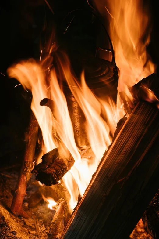 a close up of a fire in the dark, by Gwen Barnard, pexels contest winner, renaissance, warm wood, avatar image, outdoor photo, relaxing