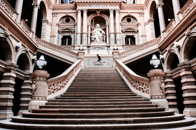 a staircase leading up to the top of a building, by Anita Malfatti, pexels contest winner, visual art, sitting on a grand staircase, doing a kickflip over stairs, monaco, khedival opera house