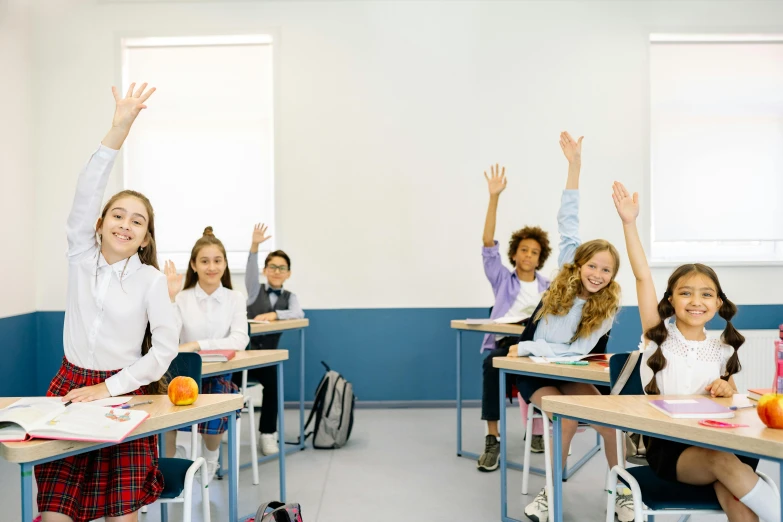 a group of girls sitting at desks in a classroom, by Gavin Hamilton, trending on pexels, danube school, triumphant pose, girl wearing uniform, product introduction photo, scene from a movie