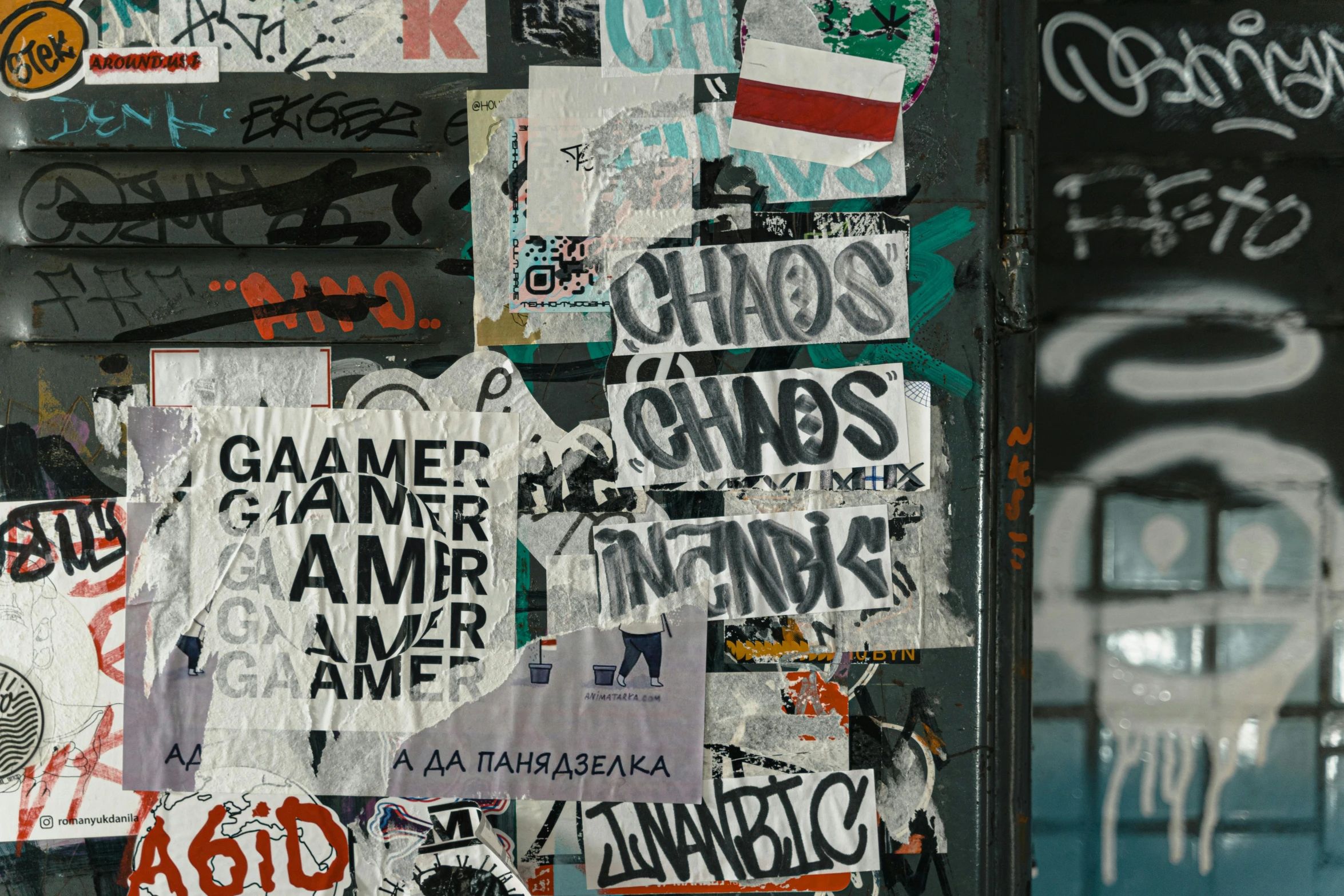 a bunch of stickers on the side of a building, trending on pexels, graffiti, warhammer chaos, inside a messy room, overlaid with cyrillic words, games lag