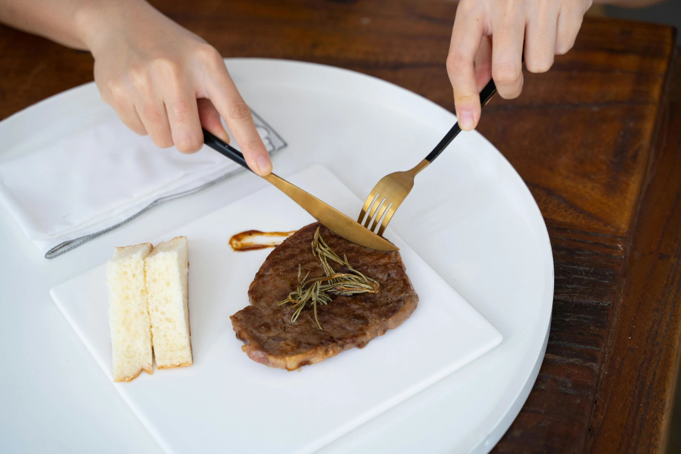 a person cutting a piece of steak on a plate, inspired by Josefina Tanganelli Plana, material brass & copper gold, using fork, thick set features, ( ultra realistic