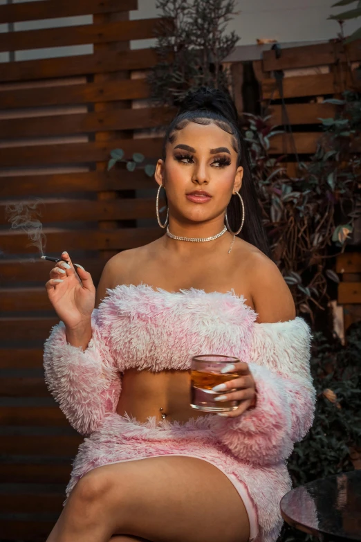 a woman sitting on a chair smoking a cigarette, an album cover, inspired by Elsa Bleda, trending on pexels, tanned ameera al taweel, pink fur, with a drink, betty la fea