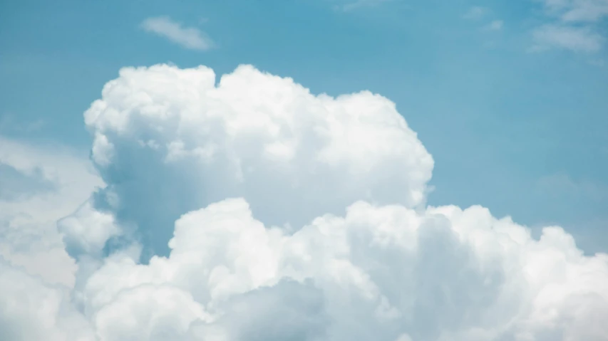 a plane flying through a cloudy blue sky, unsplash, magic realism, cumulus cloud tattoos, avatar image