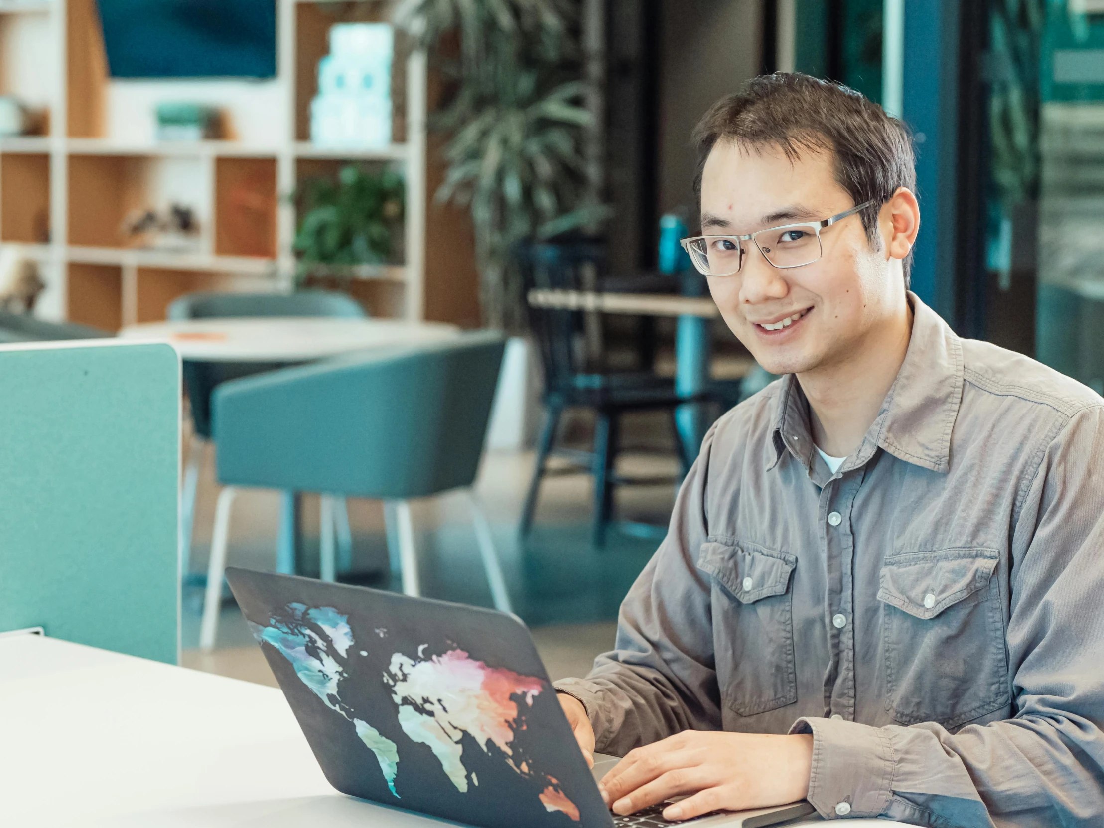 a man sitting at a table with a laptop, a computer rendering, pexels contest winner, shin hanga, in an office, avatar image, programmer, high resolution image