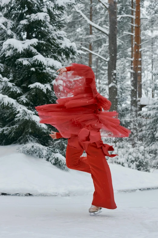 a person that is standing in the snow, swirling red-colored silk fabric, swedish forest, off - white collection, running freely