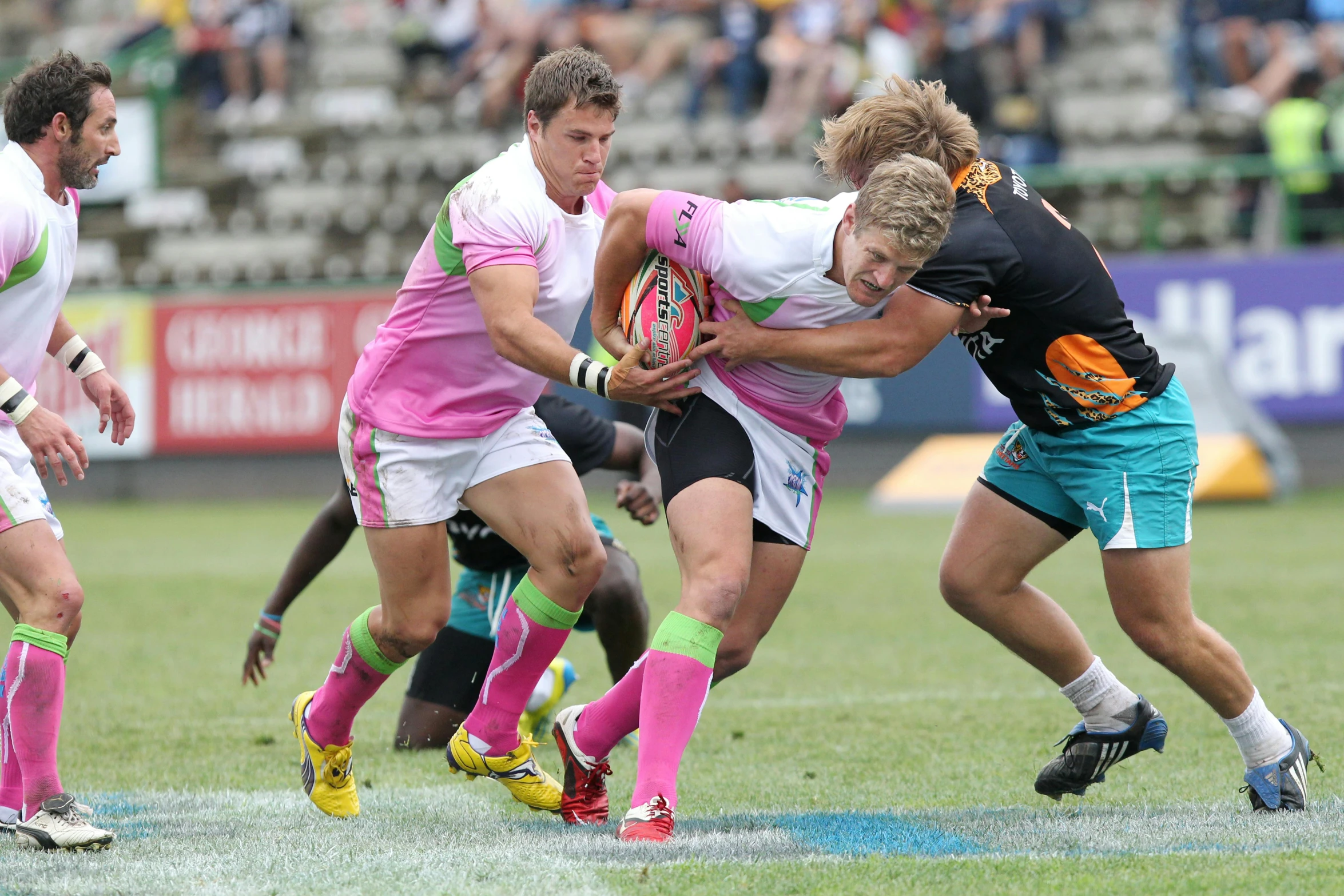a group of people playing a game of rugby, pink white and green, alex kanevsky, joel fletcher, profile shot