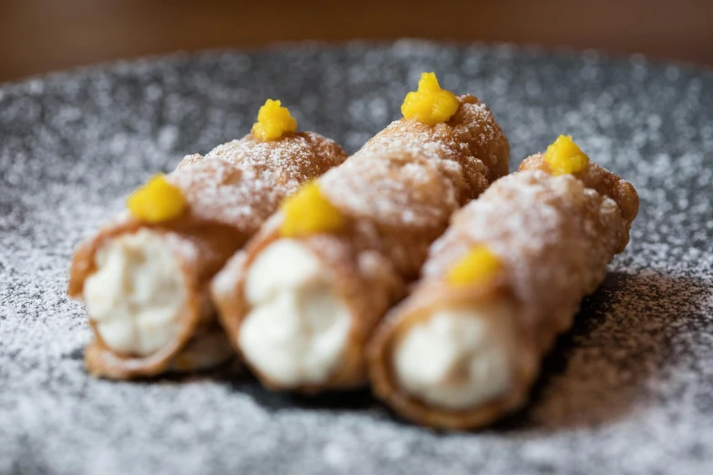 a close up of a plate of food on a table, sweets, citrinitas, caparisons, profile image