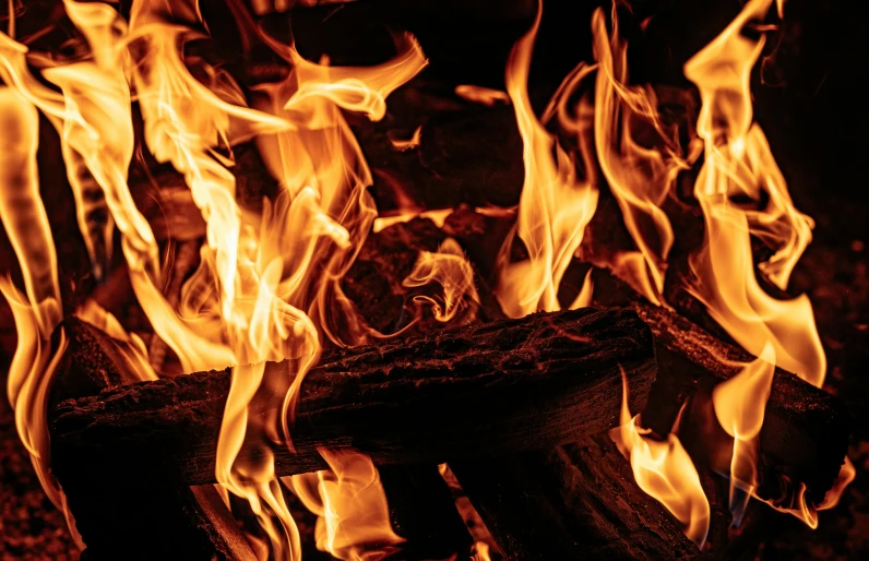 a close up of a fire with flames coming out of it, pexels, renaissance, a wooden, multiple stories, profile pic, full frame image