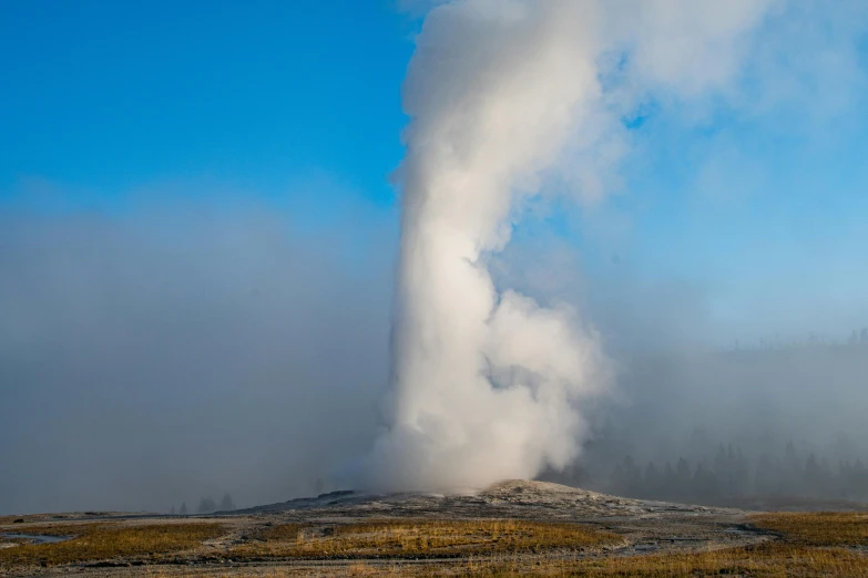 a large geyse in the middle of a field, by Sven Erixson, unsplash contest winner, white steam on the side, pillar, geology, square