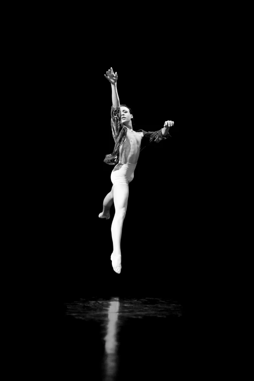 a black and white photo of a person jumping in the air, arabesque, patrick nagle!!!, neil leifer, uploaded, male!!