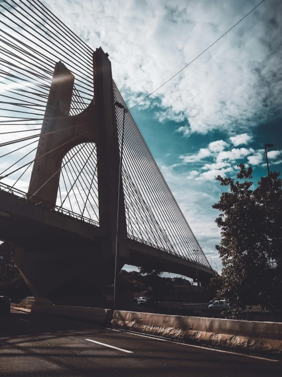 a view of a bridge from the side of the road, by Xavier Blum Pinto, pexels contest winner, futuristic sao paulo, dramatic details, instagram story, today\'s featured photograph 4k