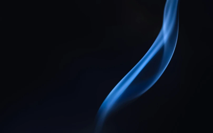 a close up of a blue smoke on a black background, a macro photograph, by Daniel Seghers, unsplash, minimalism, flare, new mexico, smooth lines, fire in background