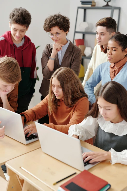 a group of people working on laptops in a classroom, a digital rendering, trending on pexels, incoherents, teenage, curious, 2 5 6 x 2 5 6 pixels, russian academic