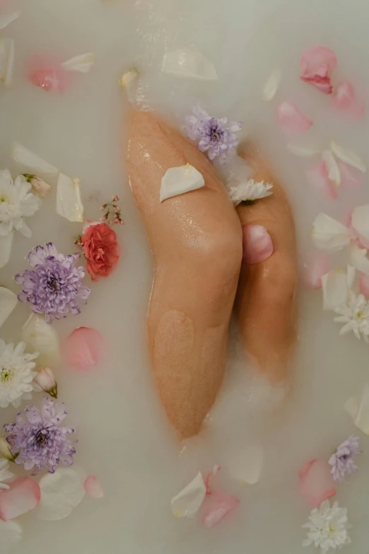 two hot dogs in a bath filled with flowers, inspired by Tracey Emin, trending on pexels, close-up on legs, silicone skin, ignant, soft texture