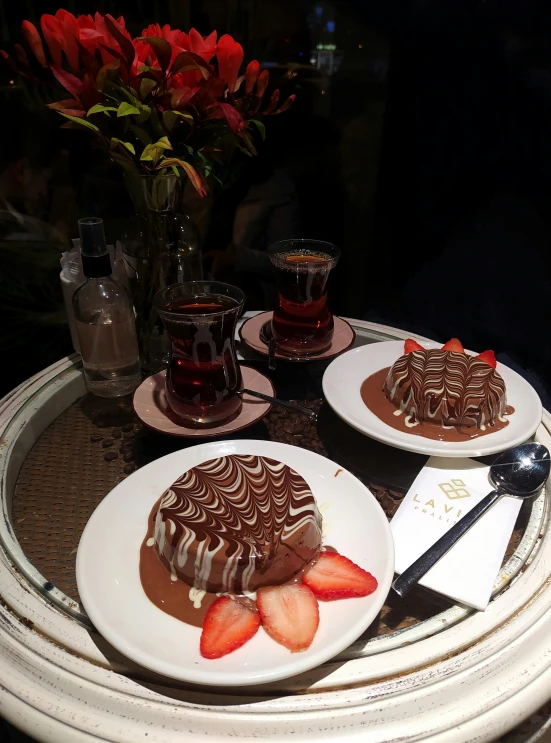 a close up of two plates of food on a table, by Basuki Abdullah, instagram, fully chocolate, desert!!!, nightcafe, high quality picture