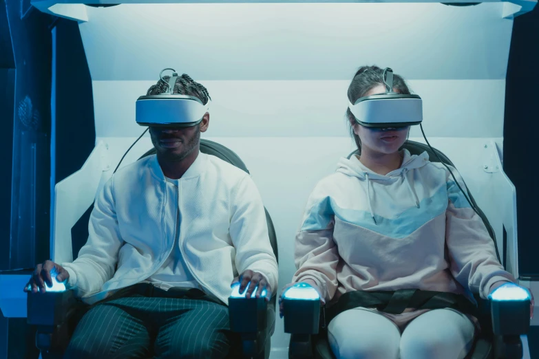 a man and a woman wearing virtual reality headsets, by Adam Marczyński, trending on unsplash, interactive art, sitting down, siggraph, hyper realistic sci fi realistic, passengers