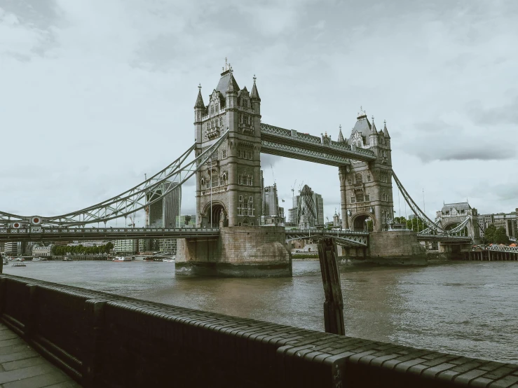 a black and white photo of the tower bridge, inspired by Thomas Struth, pexels contest winner, hyperrealism, 1960s color photograph, medium format, cinematic”, desaturated