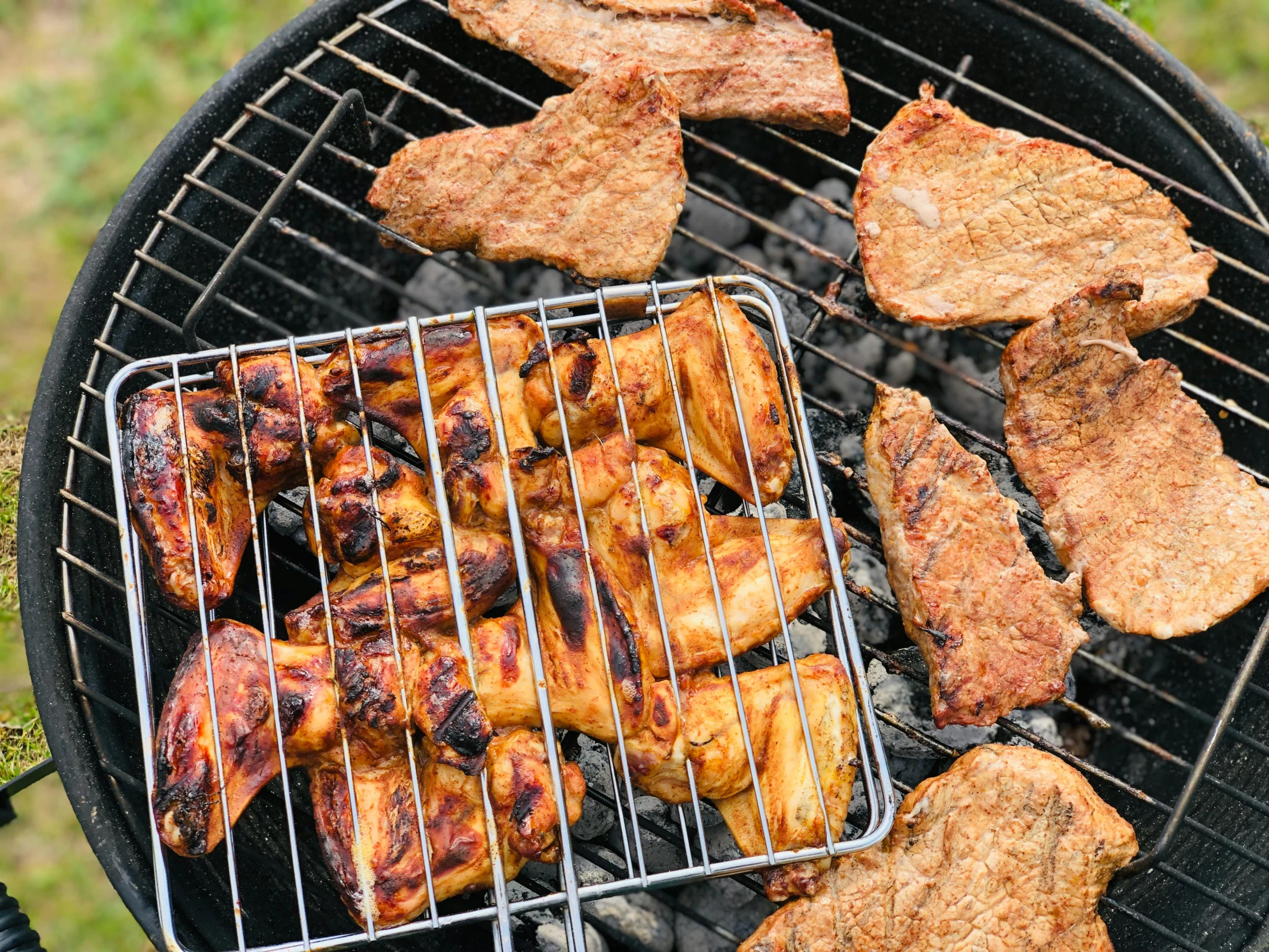 a close up of a grill with meat on it, by Julia Pishtar, fan favorite, turkey, test, picnic