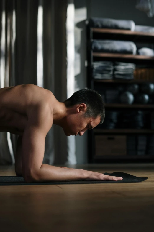 a man doing push ups on a yoga mat, renaissance, physical : tinyest midriff ever, christopher cao, side profile shot, hypersphere