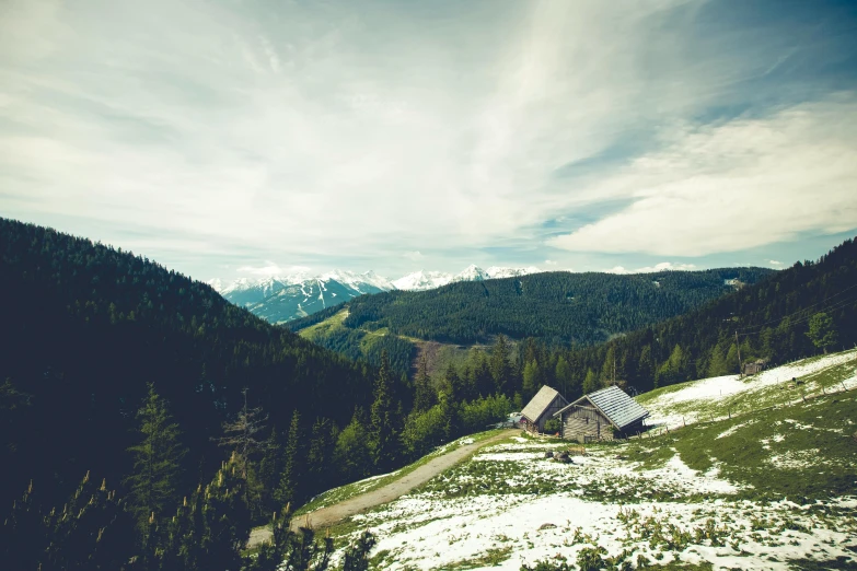 a house sitting on top of a snow covered hillside, pexels contest winner, renaissance, solo hiking in mountains trees, old cabin, 9 9 designs, lush countryside