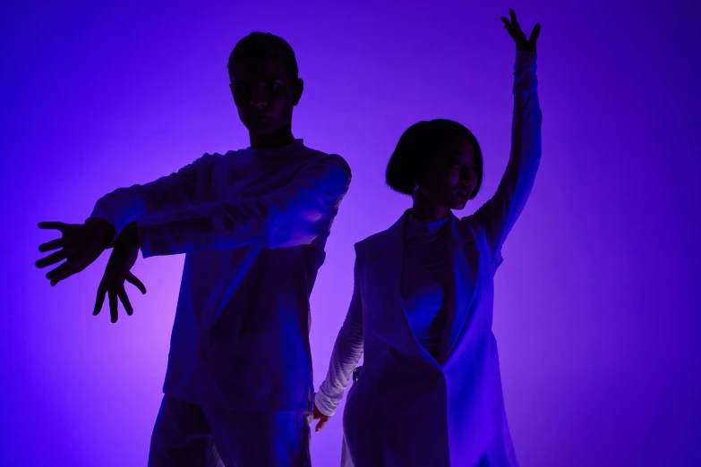 a couple of people standing next to each other, unsplash, antipodeans, purple volumetric lighting, dancers, asya yoranova and alan lee, slide show