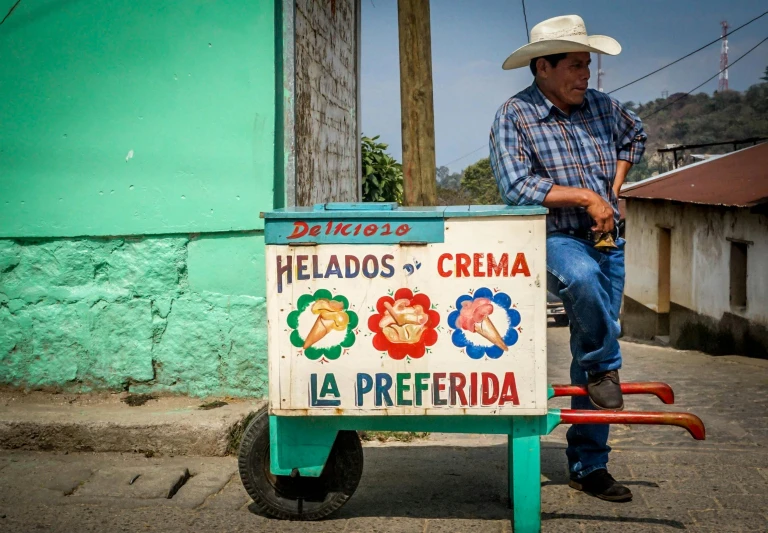 a man sitting on a bench in front of a sign, verdadism, chilaquiles, ice cream on the side, slide show, cream of the crop