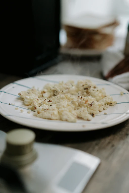 a close up of a plate of food on a table, a digital rendering, unsplash, renaissance, flour dust, made of swiss cheese wheels, gif, burnt