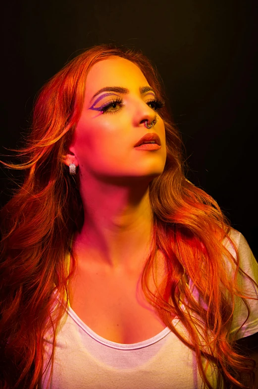 a woman with long red hair wearing a white shirt, an album cover, inspired by Julia Pishtar, trending on pexels, colored lighting, kailee mandel, justify, orange and red lighting