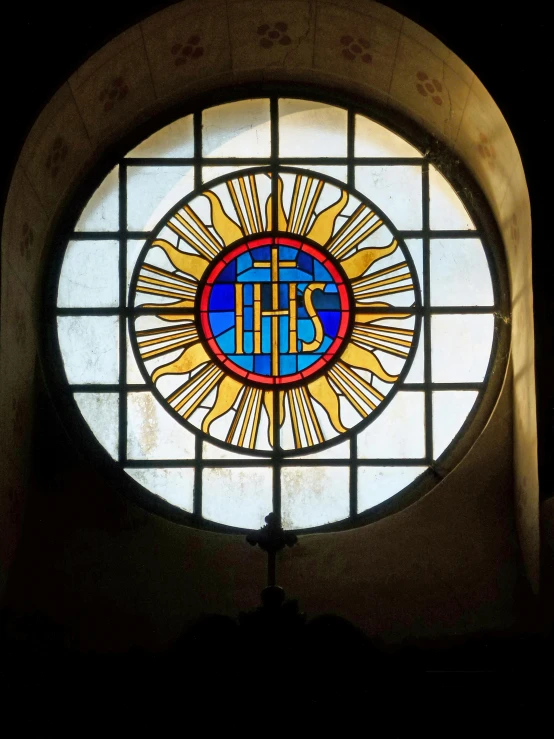 a close up of a stained glass window in a building, an album cover, inspired by Hans Memling, unsplash, suns, 2 5 6 x 2 5 6 pixels, roman catholic icon, 🚿🗝📝