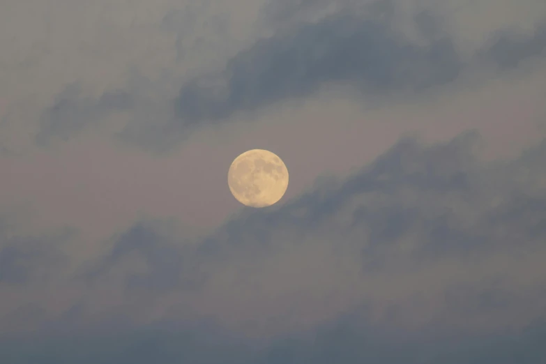 a plane flying in the sky with a full moon in the background, pexels, romanticism, pale beige sky, humid evening, pink, grey