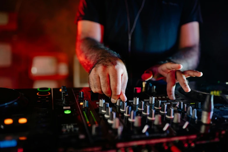 a close up of a dj playing music on a mixer, pexels, bartending, avatar image, instagram post, david normal