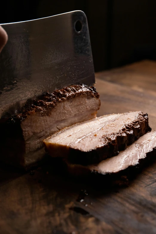 a person cutting a piece of meat with a knife, liquid smoke, thumbnail, brown, up close