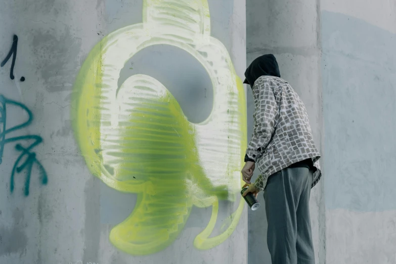 a man is painting a banana on a wall, by INO, unsplash, graffiti, still from the film, giant fluorescent fungi, grey, bubble