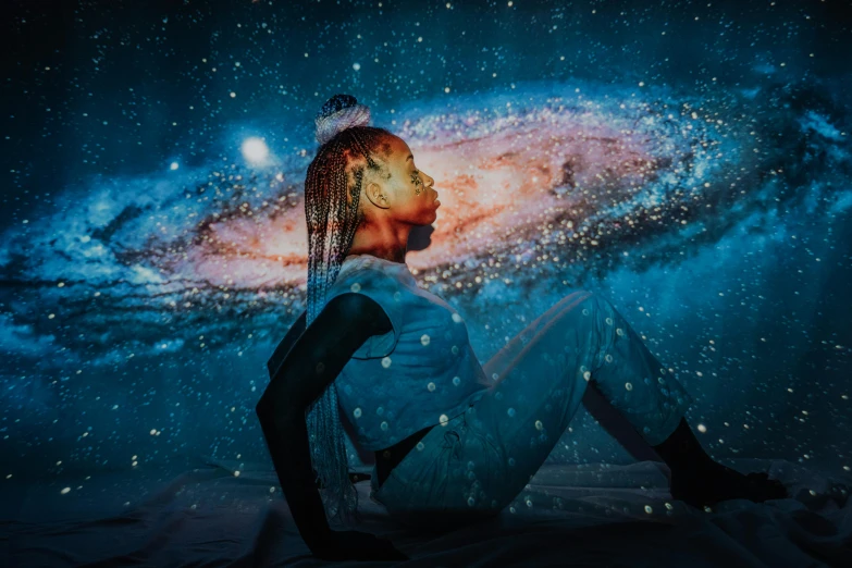 a woman sitting on top of a bed in front of a galaxy, pexels contest winner, afrofuturism, photo of a black woman, psychedelic therapy, pictured from the shoulders up, space theme