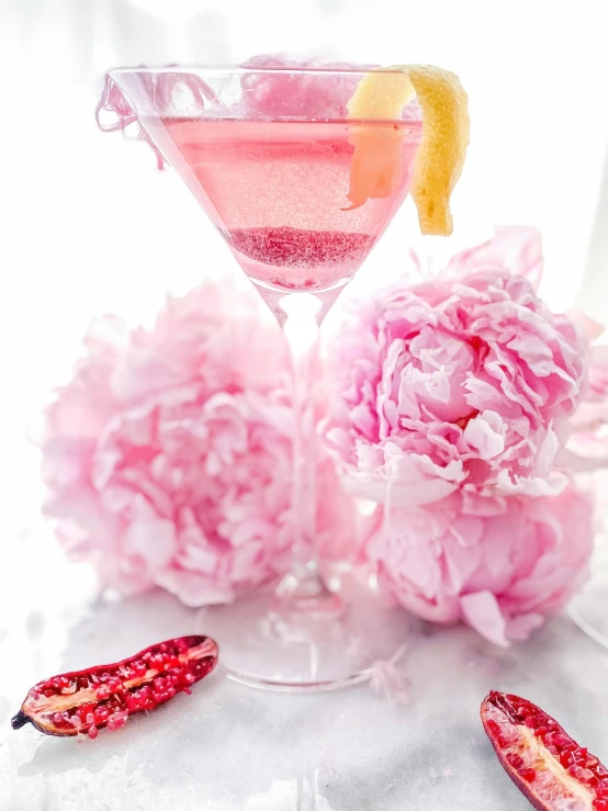 a pink cocktail sitting on top of a white table, 💋 💄 👠 👗, peony, thumbnail, profile image