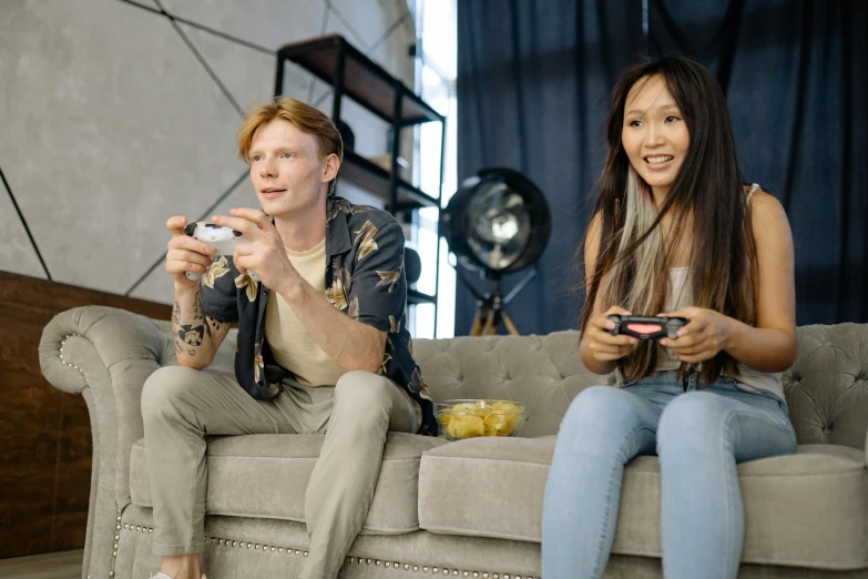 a couple of people that are sitting on a couch, pexels contest winner, video game design, asian female, 15081959 21121991 01012000 4k, linus from linustechtips