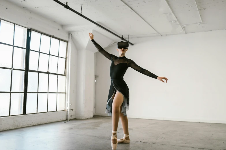 a woman in a black leo leo leo leo leo leo leo leo leo leo leo leo leo, a hologram, inspired by Elizabeth Polunin, unsplash contest winner, arabesque, virtual reality headset, dressed as a ballerina, wearing vr goggles, lachlan bailey