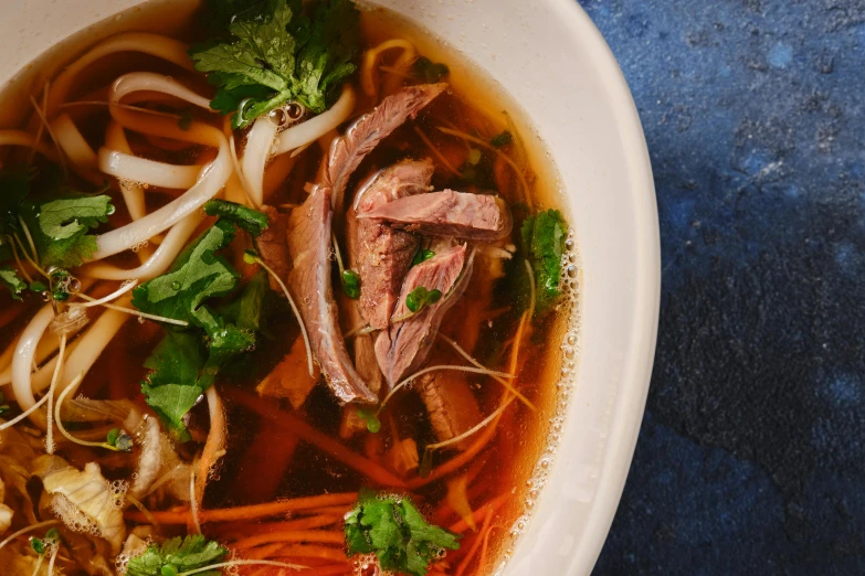 a bowl of soup with meat and vegetables, inspired by Tan Ting-pho, pexels contest winner, sōsaku hanga, side view intricate details, thumbnail, brown, birdseye view