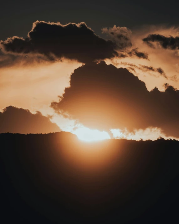 the sun is setting behind the clouds in the sky, pexels contest winner, romanticism, zoomed out, magestic, instagram post, silver lining