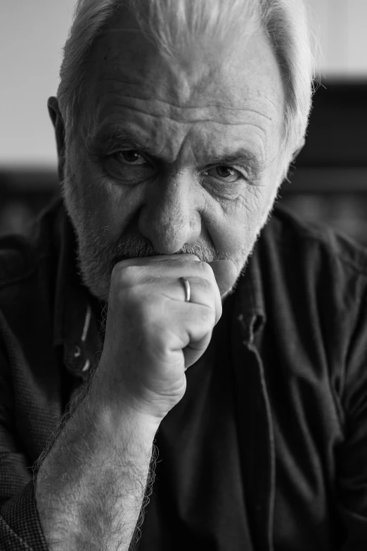 a black and white photo of an older man, inspired by Lajos Vajda, brian jacques, angry looking at camera, author zima blue, john pawson