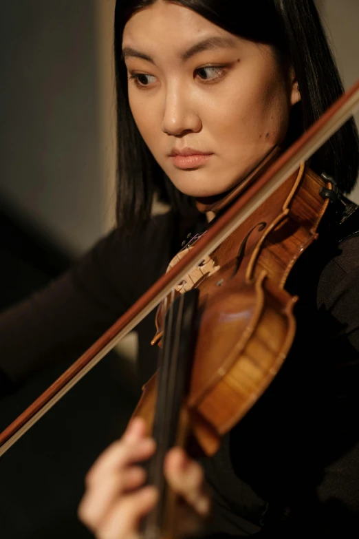 a close up of a person playing a violin, jingna zhang, front portrait, medium head to shoulder shot, ((tatsuro yamashita))