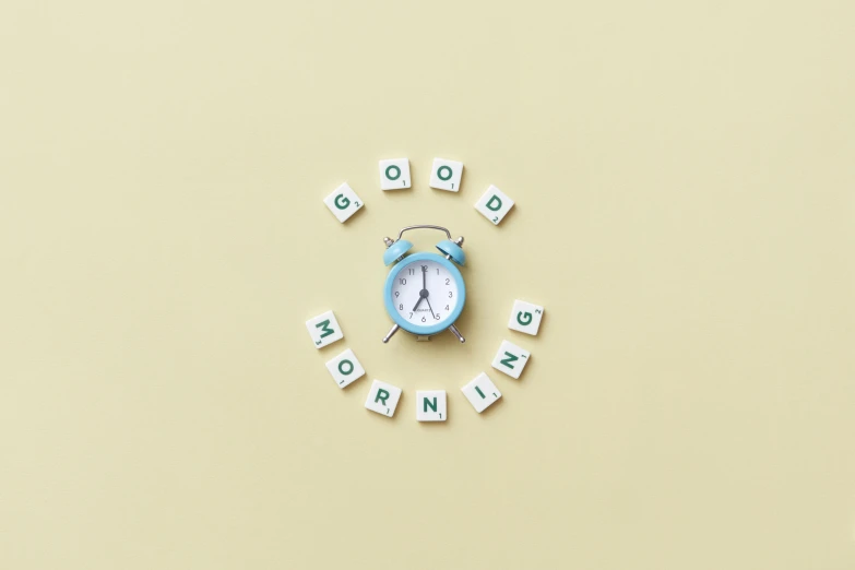 a clock with the words good morning written on it, by Awataguchi Takamitsu, trending on pexels, knolling, pastel blue, background image, morning. hyperrealism