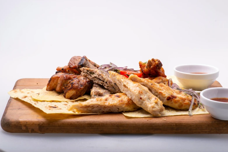 a wooden cutting board topped with lots of food, by Tom Bonson, greek ameera al taweel, battered, set against a white background, caulfield