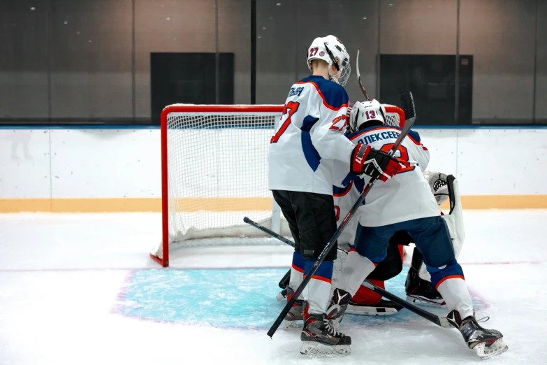 a group of young men playing a game of hockey, a picture, by Emma Andijewska, shutterstock, figuration libre, carey price goaltender, russia in 2 0 2 1, 15081959 21121991 01012000 4k, showing victory