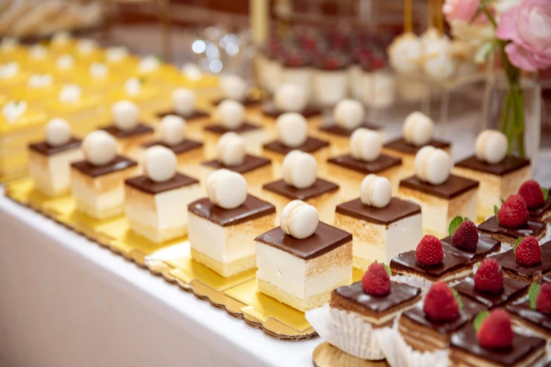 a table topped with lots of different types of desserts, a picture, square, premium quality, white and gold, thumbnail