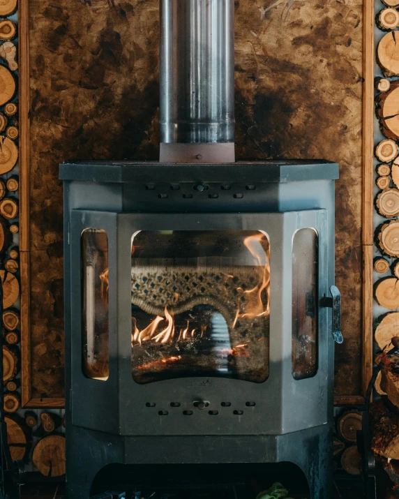 a wood burning stove in the corner of a room, by Julia Pishtar, unsplash contest winner, art nouveau, sparkly, inside of a cabin, grey, product image